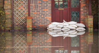 Sanbags protecting a house from flooding