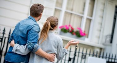 Young couple happy after a chain free house sale