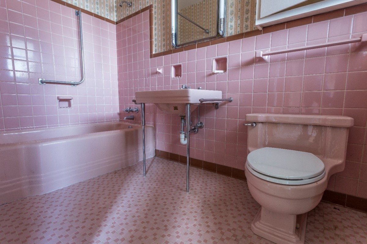 Unattractive pink bathroom puts buyers off buying your home